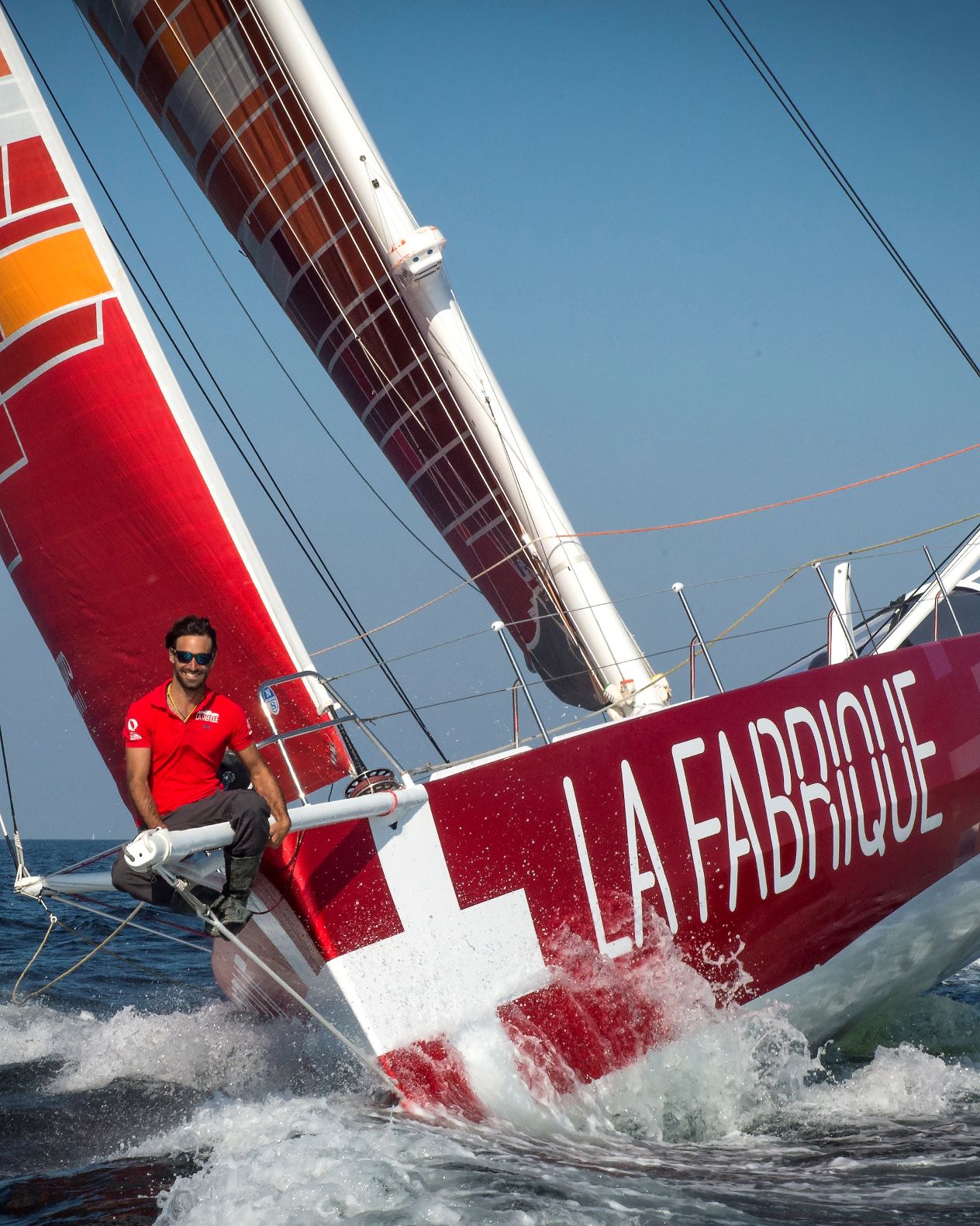 Alan Roura with La Fabrique, the boat with which he is going to take part in the Vendée Globe race