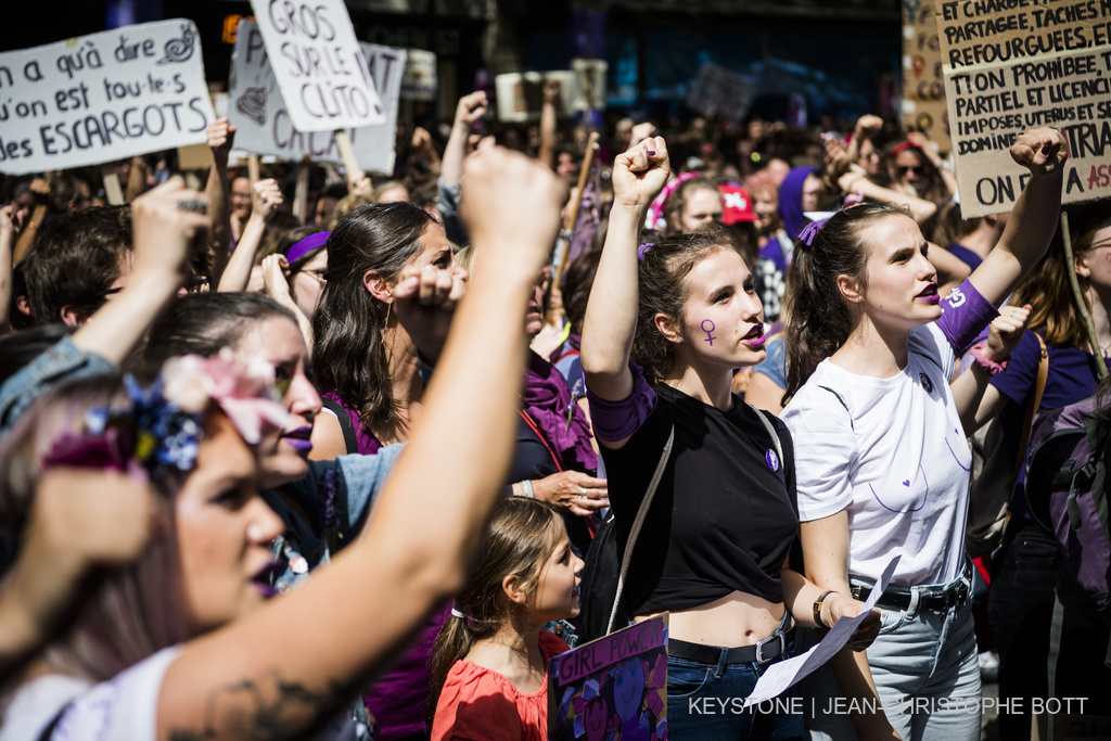 Women demonstrating on the Place St-François during the National Women's Strike on 14 June 2019 in Lausanne © KEYSTONE/Jean-Christophe Bott