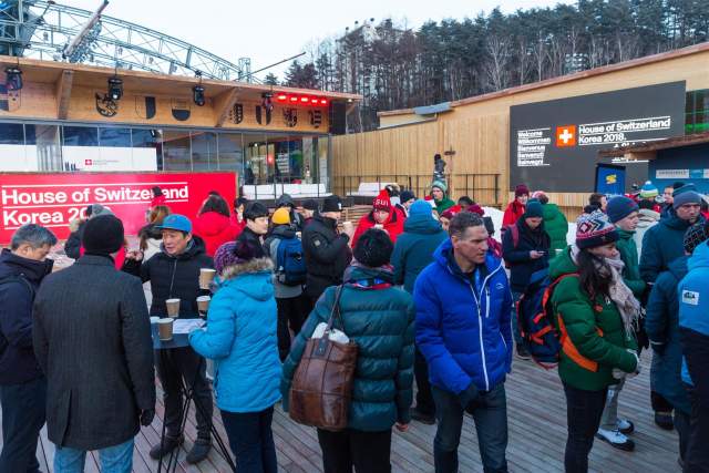 Crowd outside the House of Switzerland Korea 2018 pavilion during an event.