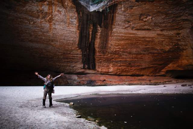 In September 2015, Sarah Marquis celebrates reaching Purnululu National Park in North-Western Australia after three months of walking. © Krystle Wright