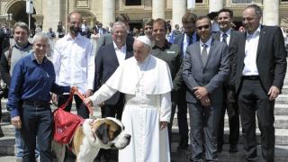 Pope Francis with Magnum the Saint Bernard